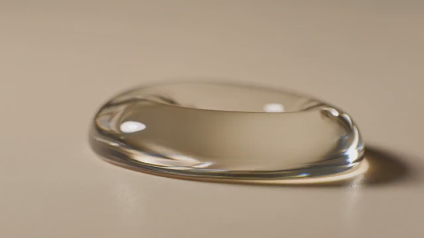 A swirl of clear serum folding over itself.